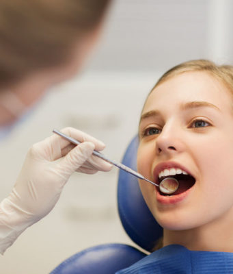 Лечение кариеса зубов у детей и подростков